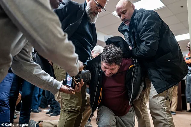 Trump supporter arrested and charged with assault after spraying Congresswoman Ilhan Omar with liquid at Minneapolis town hall