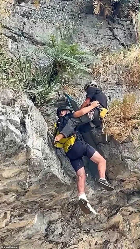 British Tourist Rescued After Being Stranded 230ft Above Thai Beach Following Paragliding Mishap