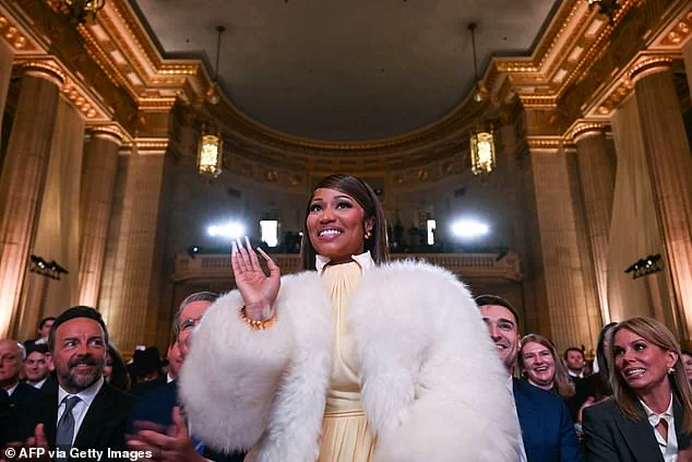 Nicki Minaj's Subdued Appearance with Trump at Controversial Financial Event Sparks Quiet Debate