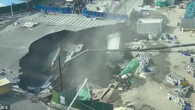 Massive Sinkhole Swallows Road at Shanghai Construction Site; No Injuries in Metro Line Development Collapse