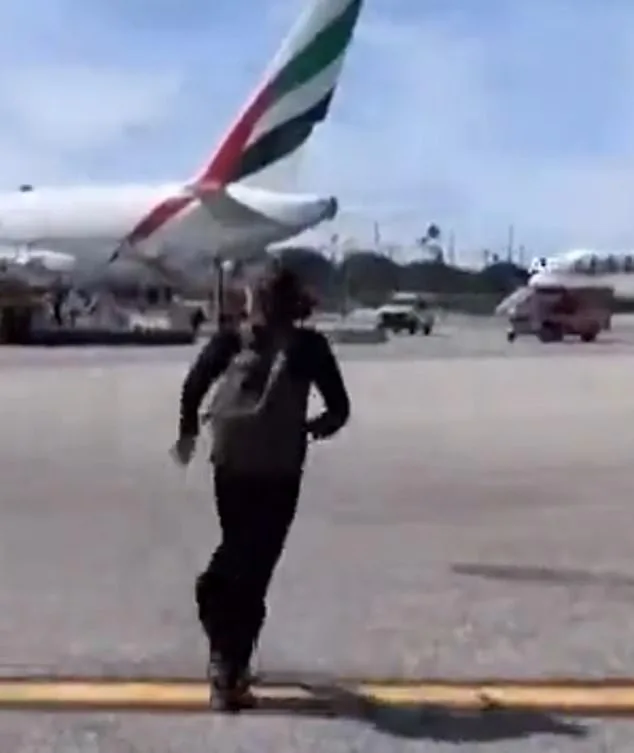 United Airlines Boeing 787 Makes Emergency Landing at LAX; Passengers Evacuate with Luggage Amid Engine Fire